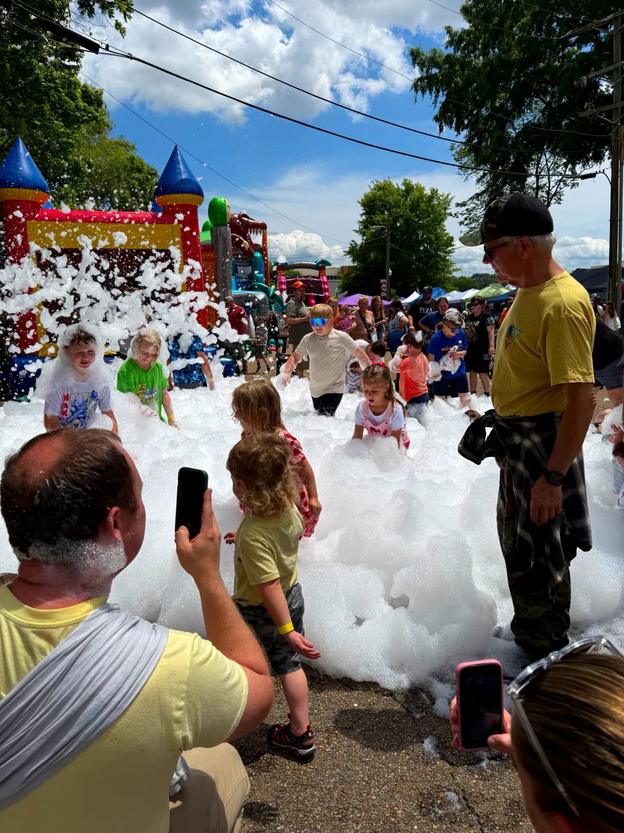Families enjoying an Elite Foam Experiences foam party